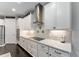 Bright kitchen featuring modern appliances, granite countertops, and ample cabinet space at 7855 Sw 97Th Cir, Ocala, FL 34481