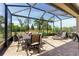 Outdoor dining and relaxing areas for enjoying the backyard scenery at 7855 Sw 97Th Cir, Ocala, FL 34481