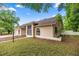 Single Gathering home with an attached two car garage and mature trees and landscaping at 8221 Sw 217 Ct, Dunnellon, FL 34431