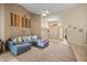 Bright and airy living room with high ceilings and a view to the front entrance at 8221 Sw 217 Ct, Dunnellon, FL 34431