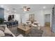 Open concept living room with tile flooring, neutral decor, and ample natural light at 8546 Sw 79Th Ave, Ocala, FL 34476