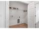 A compact laundry room with tile flooring and washer/dryer hookups at 8546 Sw 79Th Ave, Ocala, FL 34476