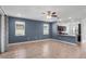 A spacious living room with tile flooring and neutral wall color offers plenty of natural light at 8546 Sw 79Th Ave, Ocala, FL 34476