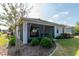 This view showcases the screened-in patio, enhancing the home's outdoor living space at 8546 Sw 79Th Ave, Ocala, FL 34476