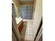 Functional bathroom featuring a vanity, toilet, and tiled shower at 8680 Sw 94Th St # D, Ocala, FL 34481