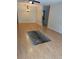 Spacious living room with hardwood floors and ample natural light at 8680 Sw 94Th St # D, Ocala, FL 34481