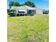 A charming single-story home with awnings, screened porch and well maintained lawn at 8683 Sw 62Nd Ct, Ocala, FL 34476