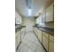 The kitchen has bright countertops and white appliances at 8683 Sw 62Nd Ct, Ocala, FL 34476