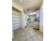 A spacious kitchen with granite countertops and white appliances at 8683 Sw 62Nd Ct, Ocala, FL 34476