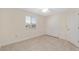 Clean bedroom featuring tile floors, a window with blinds, and a closet with double doors at 8851 Sw 116Th Street Rd, Ocala, FL 34481