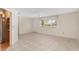 Inviting living room featuring tile floors, lots of light and neutral paint at 8851 Sw 116Th Street Rd, Ocala, FL 34481