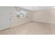 Bright living room with tile flooring and lots of natural light from window at 8851 Sw 116Th Street Rd, Ocala, FL 34481