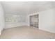 Bright sunroom with tile flooring and large windows offering ample natural light and outdoor views at 8851 Sw 116Th Street Rd, Ocala, FL 34481