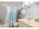 Bathroom with a shower/tub combo, a toilet, and a sink with vanity, accessorized with beach-themed decor at 8851 Sw 97Th St # A, Ocala, FL 34481