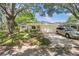 Charming single-story home with a well-manicured lawn, mature trees and an attached two-car garage at 8851 Sw 97Th St # A, Ocala, FL 34481