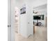 Hallway showing a bathroom with a shower and a bedroom with a TV and ceiling fan at 8851 Sw 97Th St # A, Ocala, FL 34481