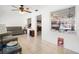 Living room with tile flooring, comfortable seating, and ample natural light, creating a welcoming space at 8851 Sw 97Th St # A, Ocala, FL 34481