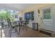 Cozy covered porch with seating area perfect for relaxing outdoors at 8851 Sw 97Th St # A, Ocala, FL 34481