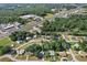 A scenic aerial view shows the neighborhood's close proximity to nearby shopping and dining at 8954 Sw 104Th Ln, Ocala, FL 34481