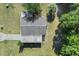Overhead view of the house showing roof with yard and trees at 8954 Sw 104Th Ln, Ocala, FL 34481