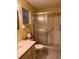 Bathroom featuring a shower with glass doors, a sink vanity, and a toilet at 9121 Sw 83Rd Ct # C, Ocala, FL 34481