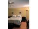 Comfortable bedroom with ceiling fan and ample natural light at 9121 Sw 83Rd Ct # C, Ocala, FL 34481