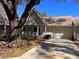 Inviting single-story home featuring an attached garage and well-maintained driveway at 9121 Sw 83Rd Ct # C, Ocala, FL 34481