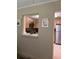 Picture through the wall into the kitchen with stainless steel appliances at 9121 Sw 83Rd Ct # C, Ocala, FL 34481