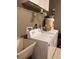 Functional laundry area featuring a washer, dryer, and utility sink for convenience at 9121 Sw 83Rd Ct # C, Ocala, FL 34481