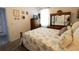 Bedroom with wooden furniture and ensuite at 9764 Sw 100Th Avenue Rd, Ocala, FL 34481