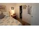 Bedroom with side table and closet access at 9764 Sw 100Th Avenue Rd, Ocala, FL 34481