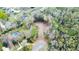 Aerial view of residential real estate lot with some houses surrounding at 0000 Se 17Th Ct, Ocala, FL 34471