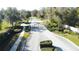 Grand entrance with a security gate and lush landscaping enhances the community's privacy and appeal at 0000 Se 17Th Ct, Ocala, FL 34471
