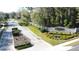 Elegant entrance gate and landscaped surroundings create a welcoming feel for this prestigious community at 0000 Se 17Th Ct, Ocala, FL 34471