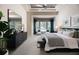 Serene main bedroom with a seating area, lots of windows, and stylish decor at 0000 Se 17Th Ct, Ocala, FL 34471
