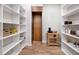 Spacious walk-in pantry with ample shelving and wood flooring at 0000 Se 17Th Ct, Ocala, FL 34471