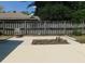 Spacious patio with seating area and privacy fence, perfect for relaxing and enjoying the private backyard at 1069 Se 57Th Ave, Ocala, FL 34480