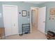 Comfortable bedroom with closet, neutral walls, and personal mementos at 1069 Se 57Th Ave, Ocala, FL 34480