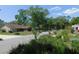 A quaint neighborhood street featuring mature trees and well-maintained homes at 1069 Se 57Th Ave, Ocala, FL 34480