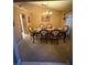 Cozy dining room with a chandelier and elegant dining set at 10999 Sw 47Th Ave, Ocala, FL 34476