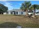 Charming single-story home with a well-manicured lawn and attractive landscaping at 10999 Sw 47Th Ave, Ocala, FL 34476