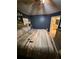 Serene main bedroom with a comfortable bed and ensuite bathroom access at 10999 Sw 47Th Ave, Ocala, FL 34476