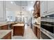 Spacious kitchen with granite counters, center island, stainless steel appliances, and ample cabinet space, perfect for cooking at 1103 Se 46Th St, Ocala, FL 34480