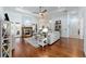 Spacious living room features hardwood floors, a fireplace, and a comfortable seating area at 1103 Se 46Th St, Ocala, FL 34480