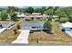 Well-maintained home with landscaping, driveway, and an attached garage, set in a suburban neighborhood at 11118 Sw 76Th Ave, Ocala, FL 34476