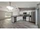 Modern kitchen with stainless steel appliances, ample counter space, and abundant natural light at 11887 Se 71St Ave, Belleview, FL 34420
