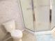 Bathroom featuring a shower and white toilet at 14244 Sw 115Th Cir, Dunnellon, FL 34432