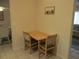 Charming breakfast nook features a small table and chairs and tile floors at 14244 Sw 115Th Cir, Dunnellon, FL 34432