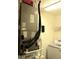 HVAC system in laundry area with washer hookups and storage shelving at 14244 Sw 115Th Cir, Dunnellon, FL 34432