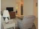 Open-concept living room, seamlessly connects the living area to the dining and kitchen spaces at 14244 Sw 115Th Cir, Dunnellon, FL 34432